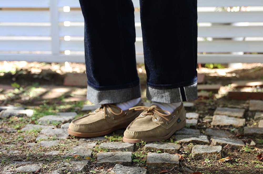 Men's feet wearing Paraboot deck shoes